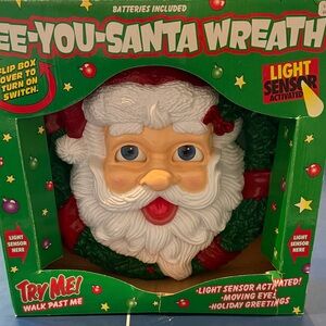 Vintage Animated See You Santa Wreath with Light Sensor activation New